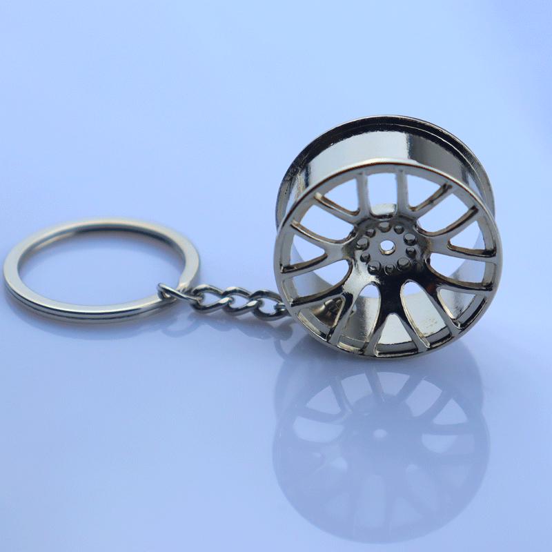 Gold Silver Black Car Wheel Keychain with Laser Logo: A Stylish Metal Accessory