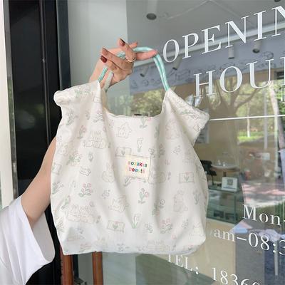 South Korea Embossed Cartoon Canvas Bag Women'S Large Capacity Hand Handbag Shopping To Work Commuting Bag