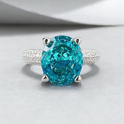 Anillo Xiancan Jewelry de Plata S925 Ovalado Corte Flor de Hielo Paraíba con Diamante de Alto Carbono.