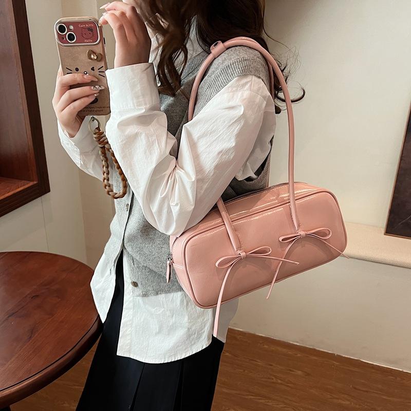 

Underarm bag single shoulder niche autumn and winter 2025 new bow red bag female baguette bag macaron 31*9*13 рожевий