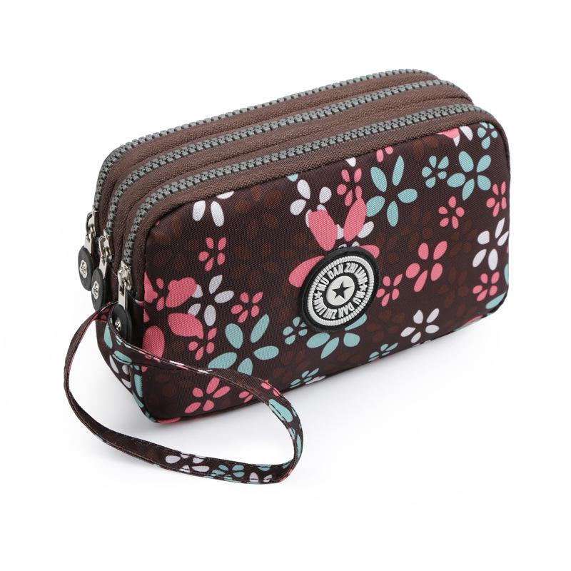 

Washable Denim Women s Multi-Compartment Clutch: Coin, Makeup, & Phone Storage.