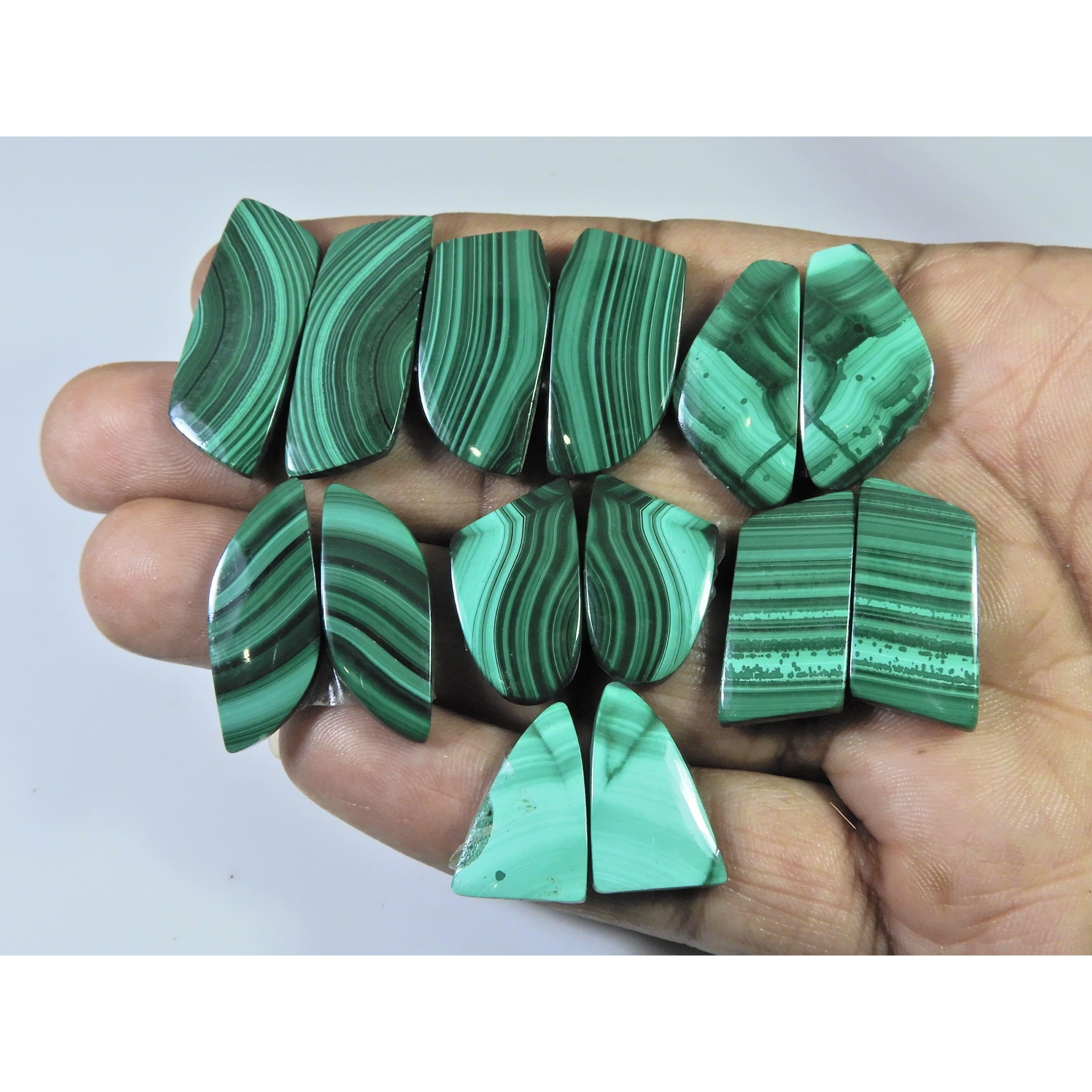 

224 карата. Натуральный малахит, парный, фантазийный кабошон, лот из 7 пар C-416