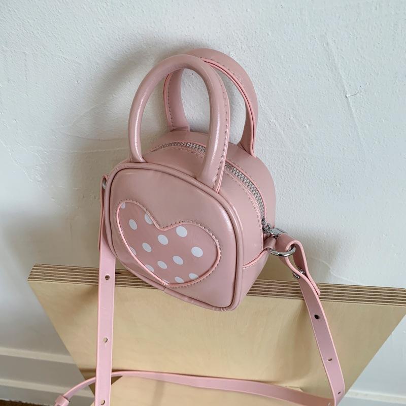 

Retro bump shoulder bag women s 2025 spring and summer new small bag niche portable bucket bag розовый