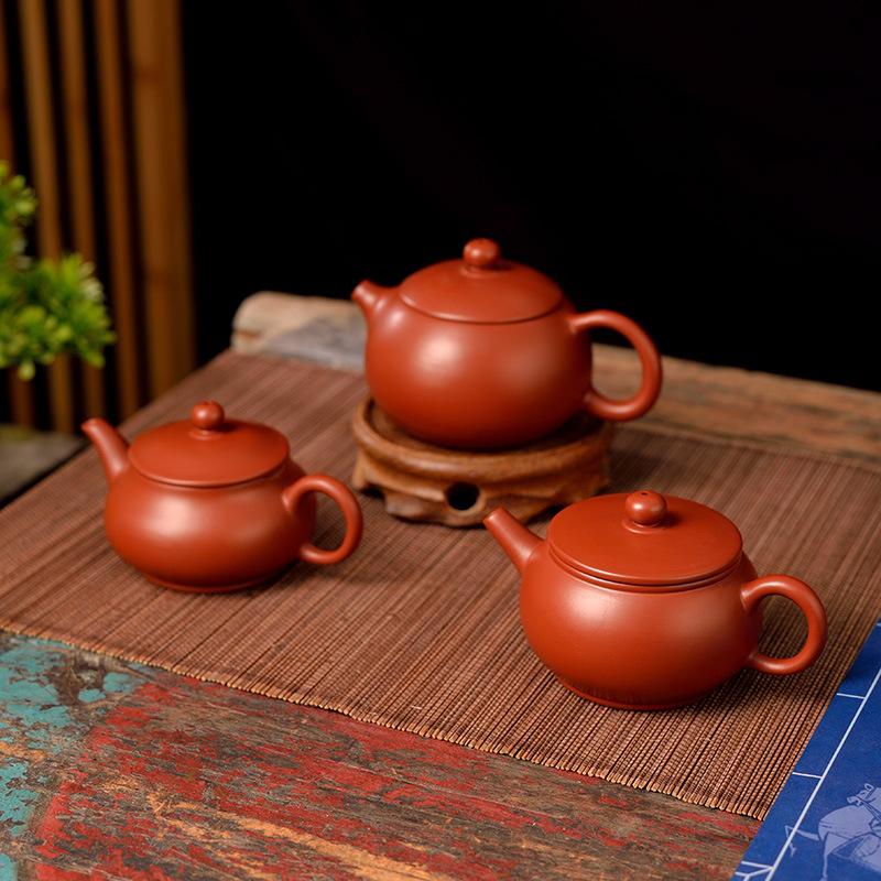 Small handmade hand-pulled vermilion mud teapot purple sand kung fu tea set Xishi pot Xishi De Zhongming furnace pot Shengji