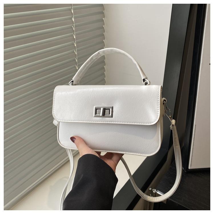 

Премиальный нишевый портативный маленький квадратный мешок женская сумка 2025 новая мода простой темперамент универсальная на плечо сумка-мессенджер сумка белый