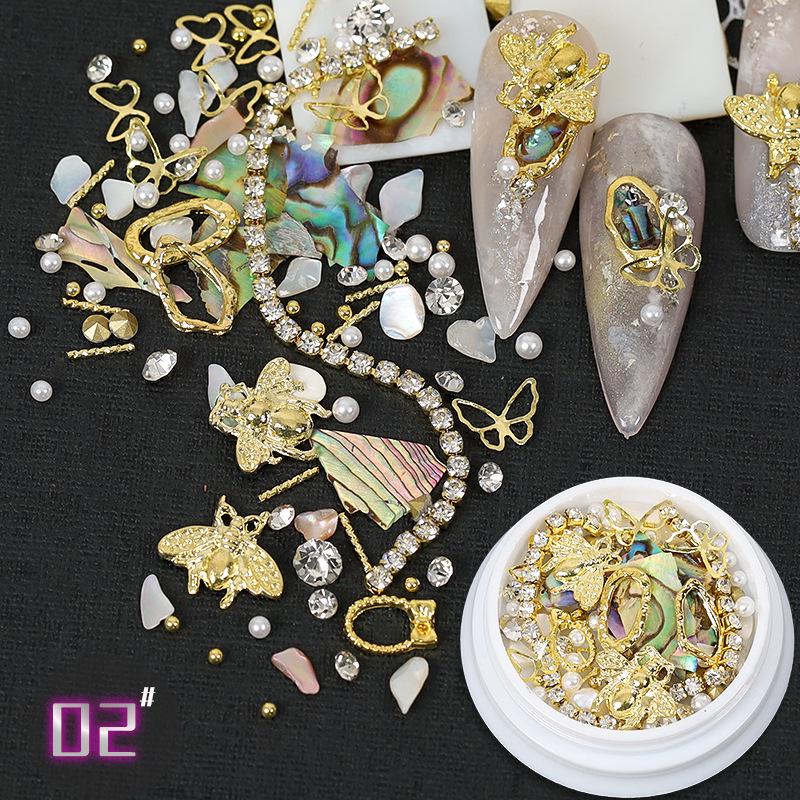Dolphin Bay Nail Art: Shell Pieces, Rhinestones, Pearls, and Metal Chains Mixed Decorations