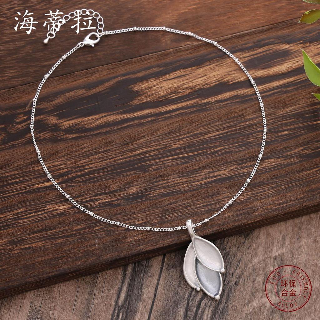 New color-coated geometric petal pendant, simple, small and fresh women's versatile leaf pendant