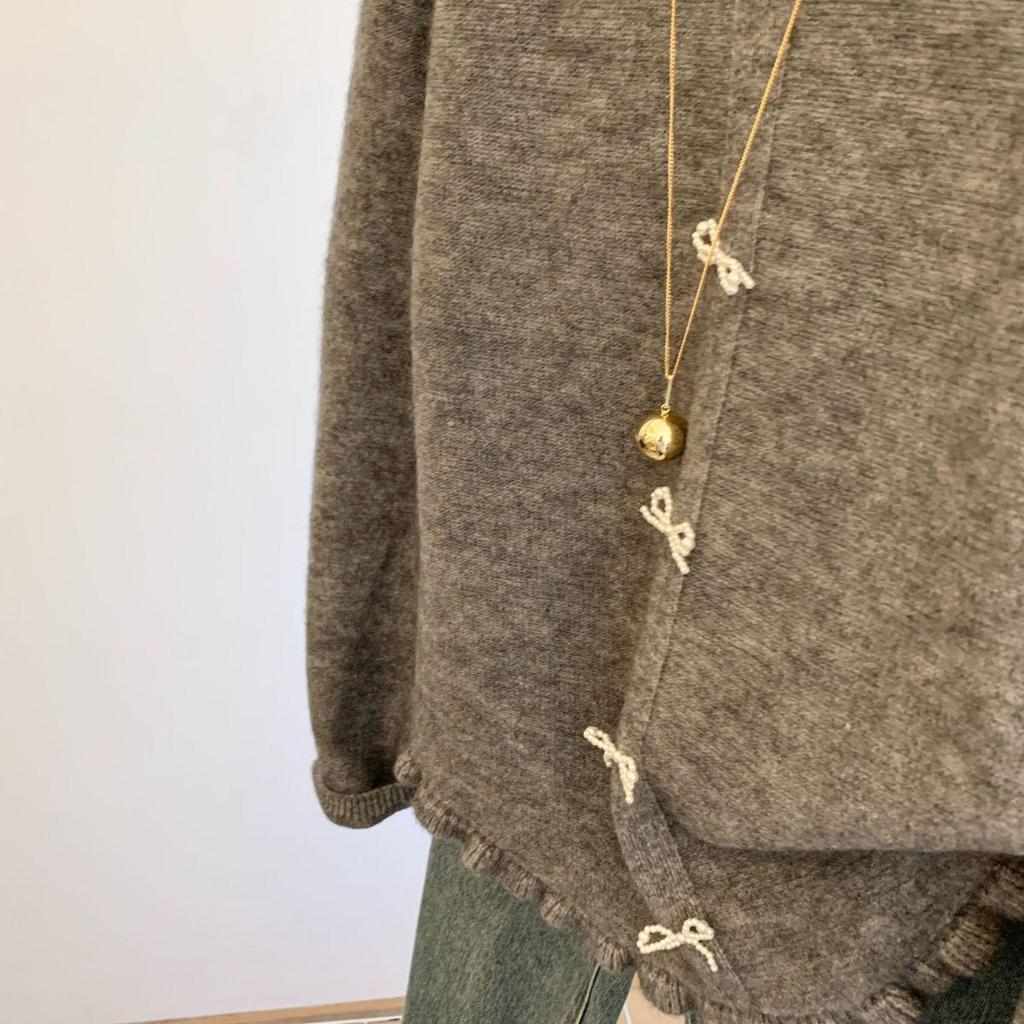 Korean Chic Lace Trim Round Neck Sweater Cardigan with Bow and Ruffle Edges for Women’s Autumn Winter Fashion.