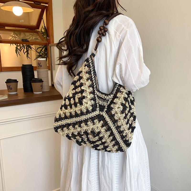 Summer fashion bag women 2025 new seaside beach hollow shoulder bag portable woven tote bag