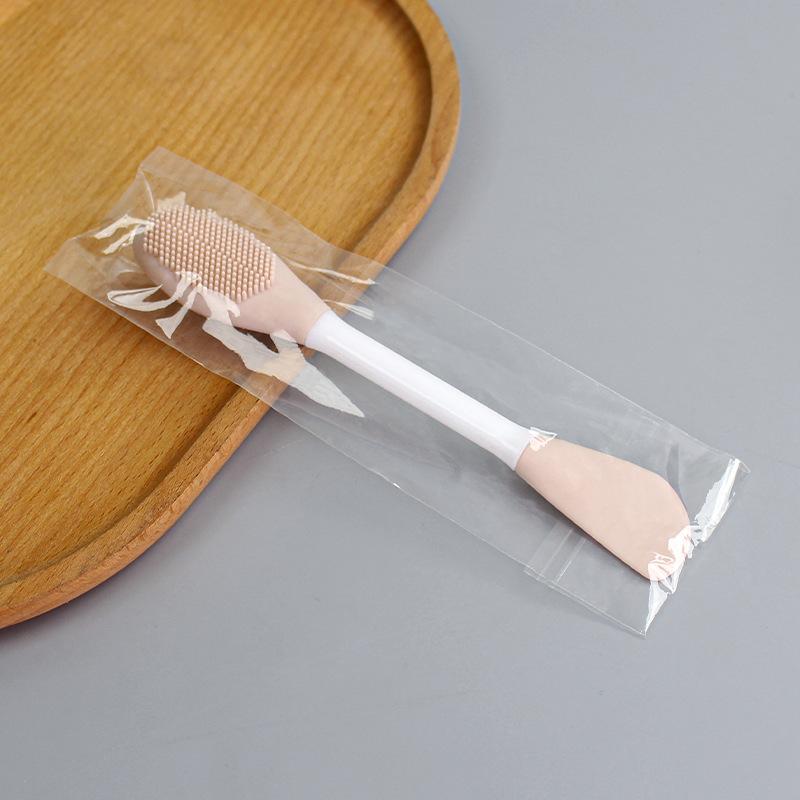 

Двусторонняя силиконовая щетка для лица Slavic Skin Care, инструмент для массажа и очищения, аппликатор для спа-масок из глины светло-розовый