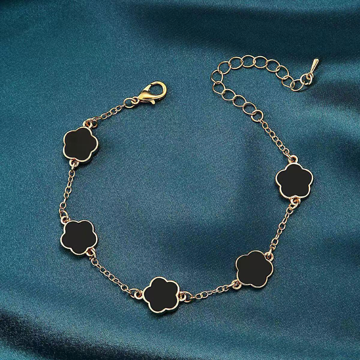 

Браслет і намисто з чотирьох листків конюшини в стилі Чжао Лусі з фіолетовим халцедоном і сережками зі стерлінгового срібла