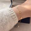 Armband med fyrklöver, pläterat med äkta guld på nysilver: Elegant, Mångsidig Design för Kvinnor
