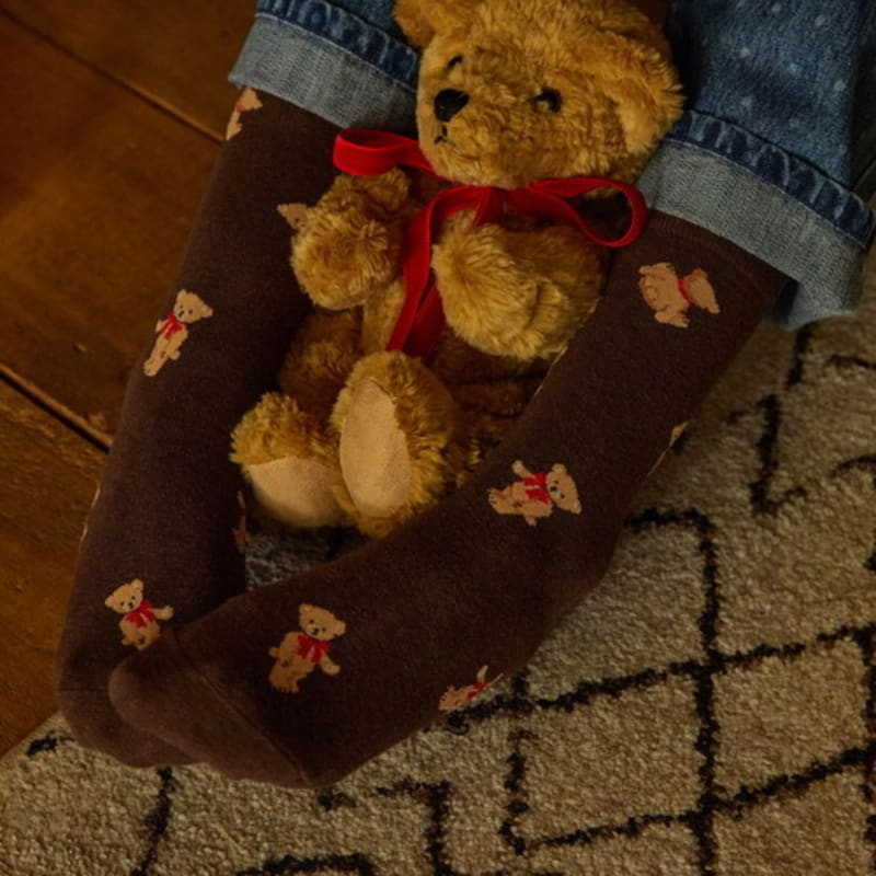 SOCKS APPEAL teddy bear with red ribbon