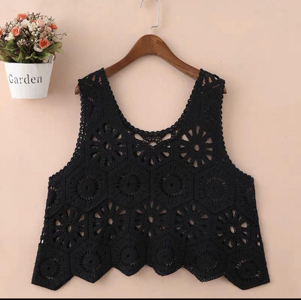 Frühling und Sommer neue einfarbige gestrickte durchbrochene Weste Weste Damen vielseitig locker ärmelloses Blusentop