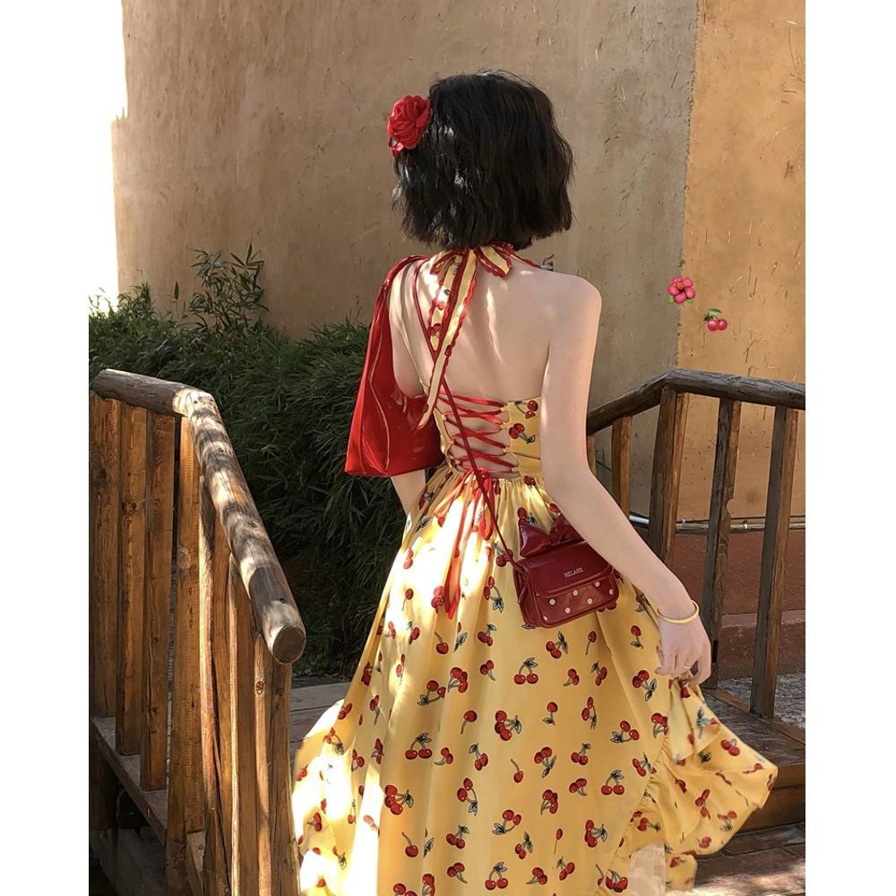 Seaside vacation style girly design charm elegant and versatile irregular casual backless suspender skirt + skirt