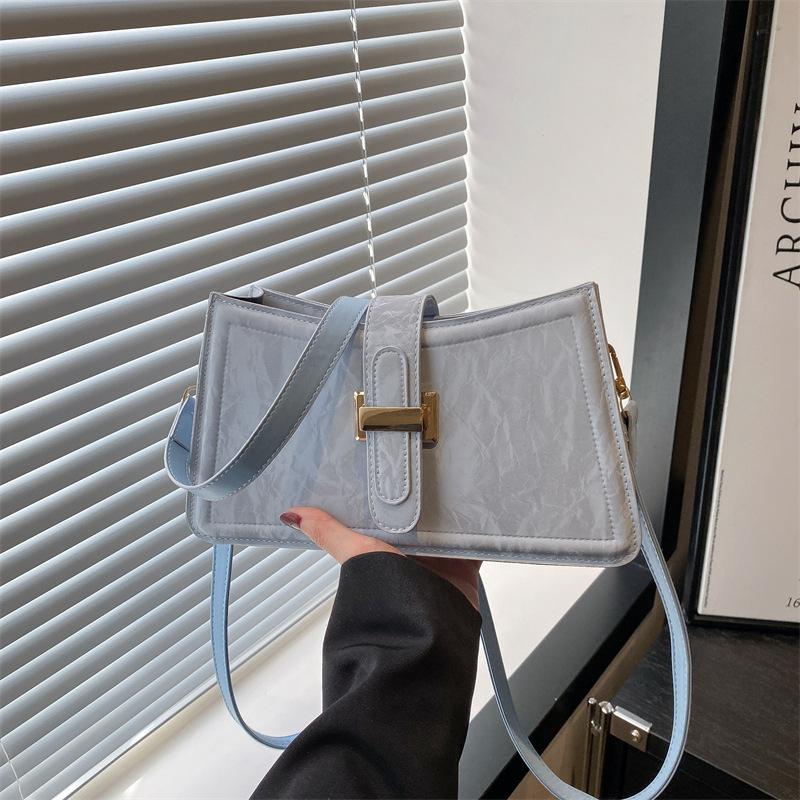 Весна новая высококачественная текстура темперамент женская легкая роскошь нишевая высокая ценность одно плечо подмышечная сумка мессенджер синий