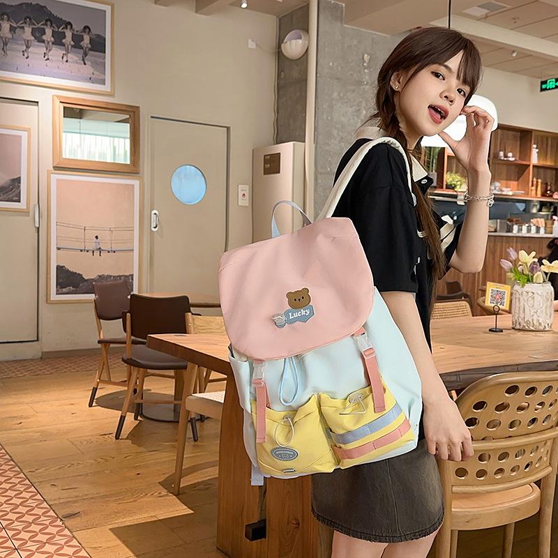High-value large-capacity casual schoolbag, college-style fashion contrasting color backpack, light waterproof and burden-reducing schoolbag for women