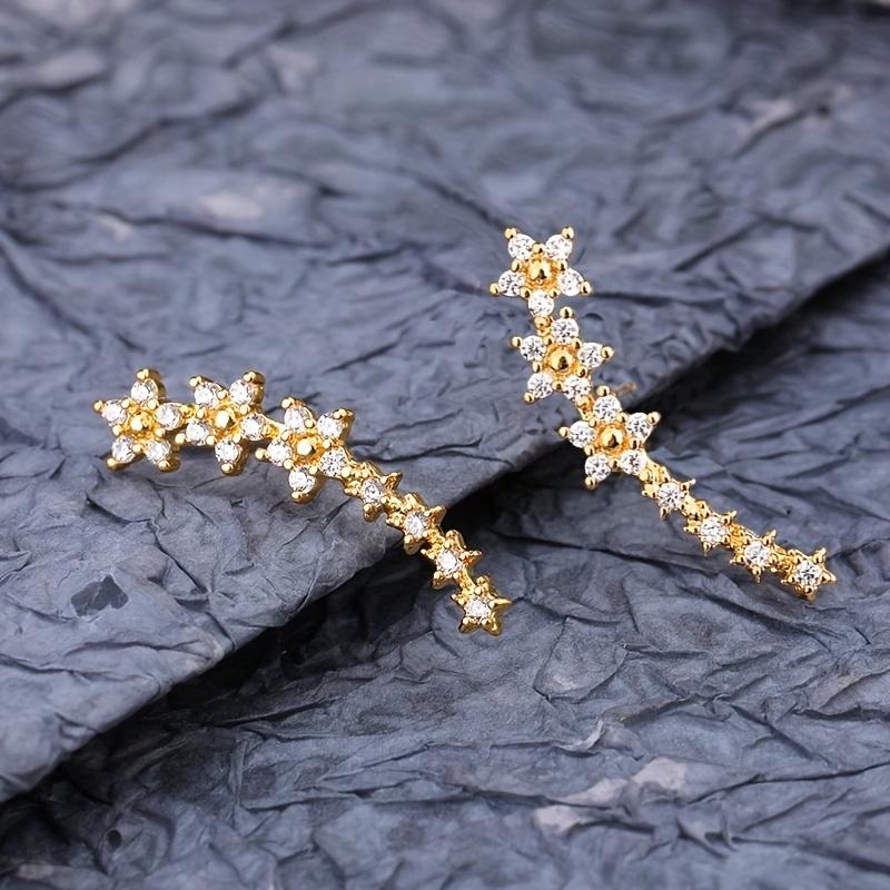 A pair of elegant and luxurious delicate floral stud earrings, fully set with diamonds and rhinestones, perfect as a Thanksgiving gift for women