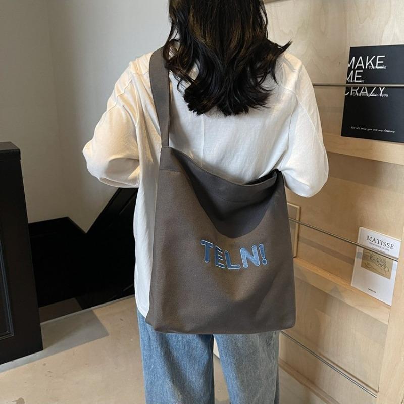 Canvas bag women's large-capacity new summer simple and versatile shoulder messenger bag college student tote bag