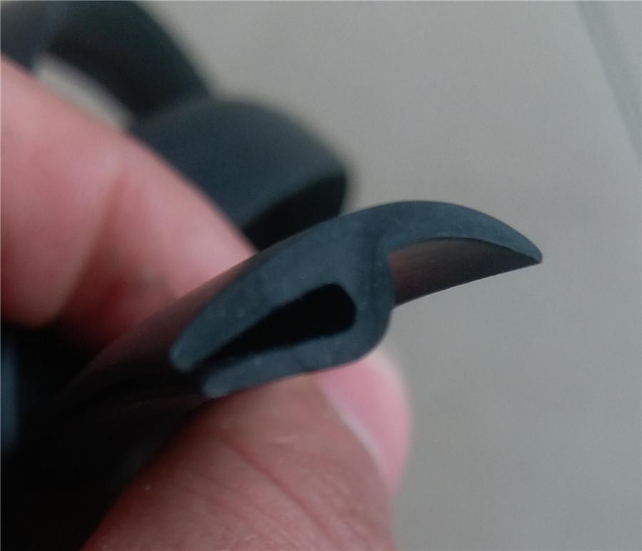 Mounted on the Plastic Panel Under the Windshield Wiper