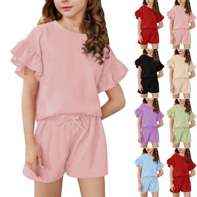 A Two-piece Set Of A Light, Solid-color Casual Sports Top With Ruffled Short-sleeved Round Neck And Shorts For Medium And Young Children In Summer