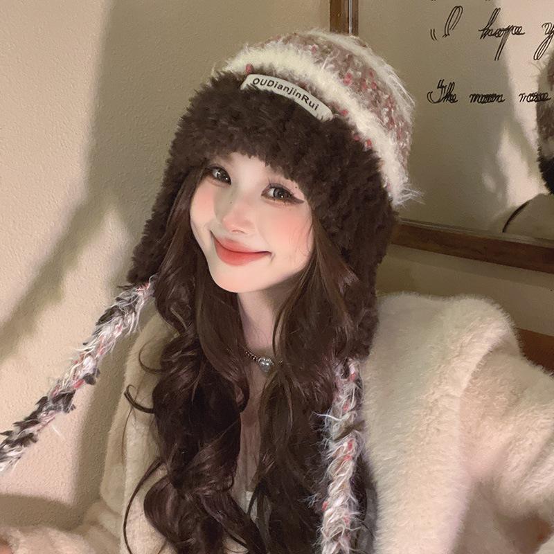 A Japanese style Winter Country Style Plush Double Braid Color Blocked Cold proof and Warm Ear Protecting Hat That Shows Off The Face