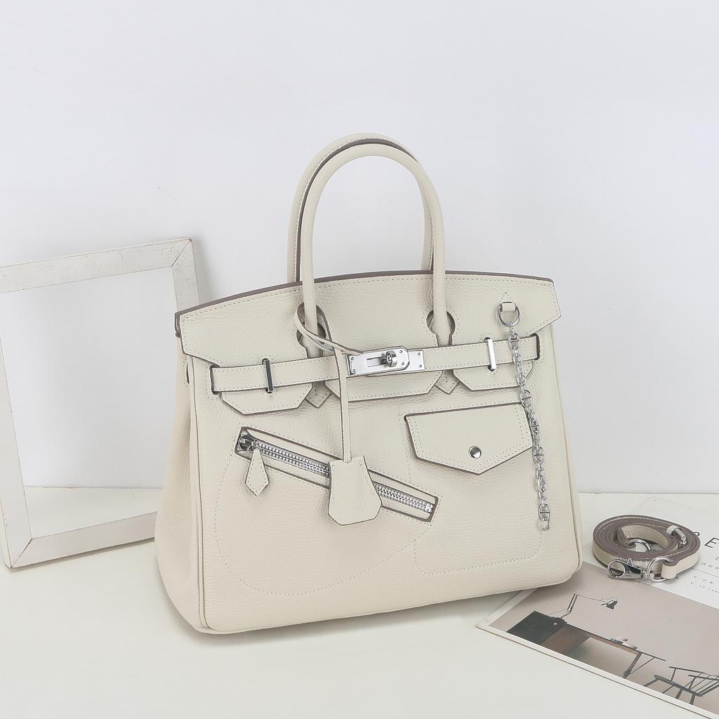 Rock-Punk-Motorradtasche aus hochwertigem, vielseitigem Leder, erstklassigem Rindsleder, geräumiger Handtasche für Damen