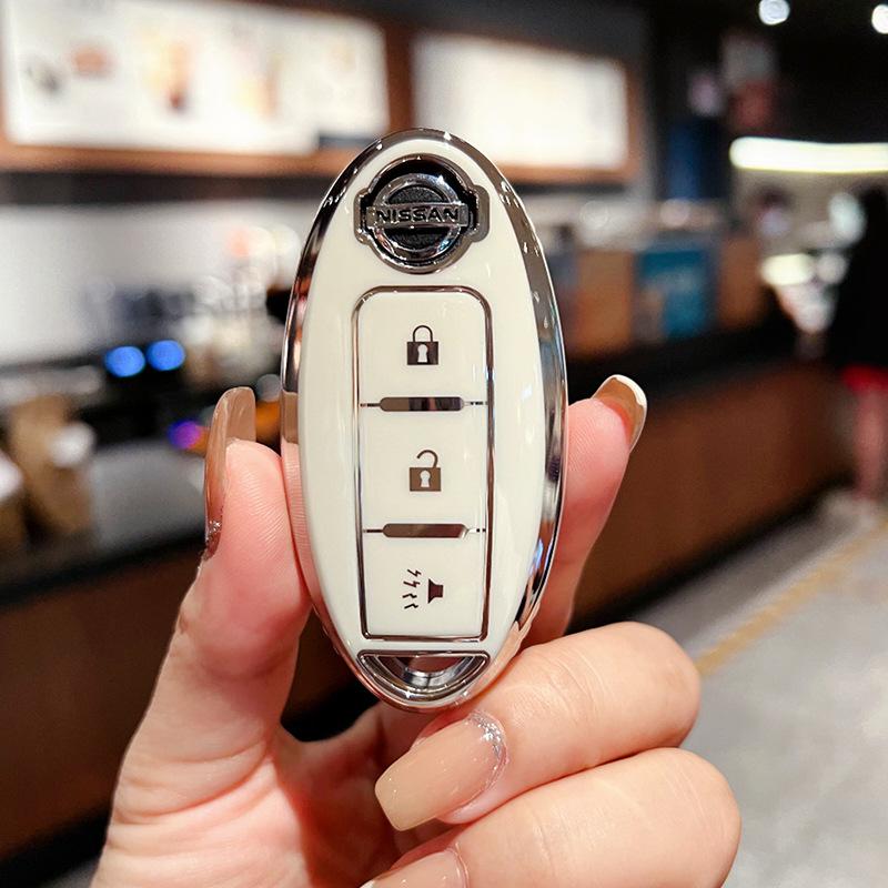 Applicable to Nissan key set 14th generation Xuanyi Bluebird Teana Sunshine Qijun Nissan Tiida bag buckle case Auto supplies