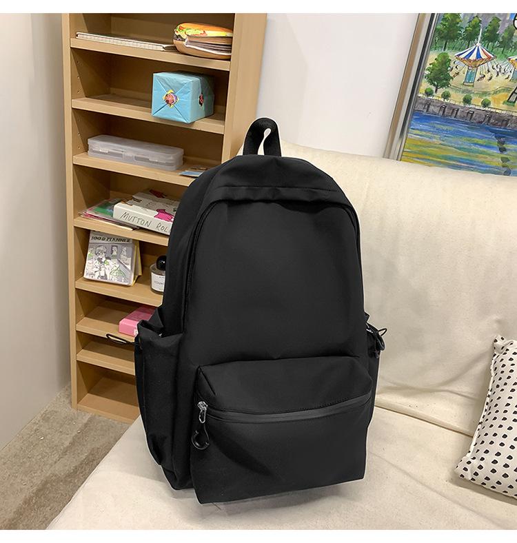 School bag solid color letter fashion backpack Korean version college student lightweight school bag outdoor travel large capacity backpack