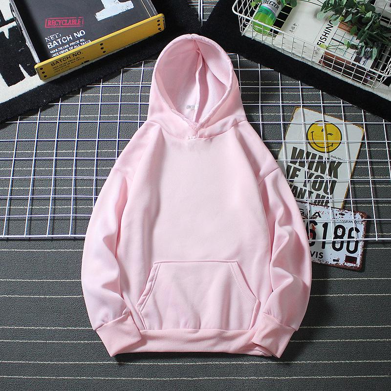 Primavera e outono nova moda feminina cor sólida com capuz bolso manga comprida camisola casual solto topo