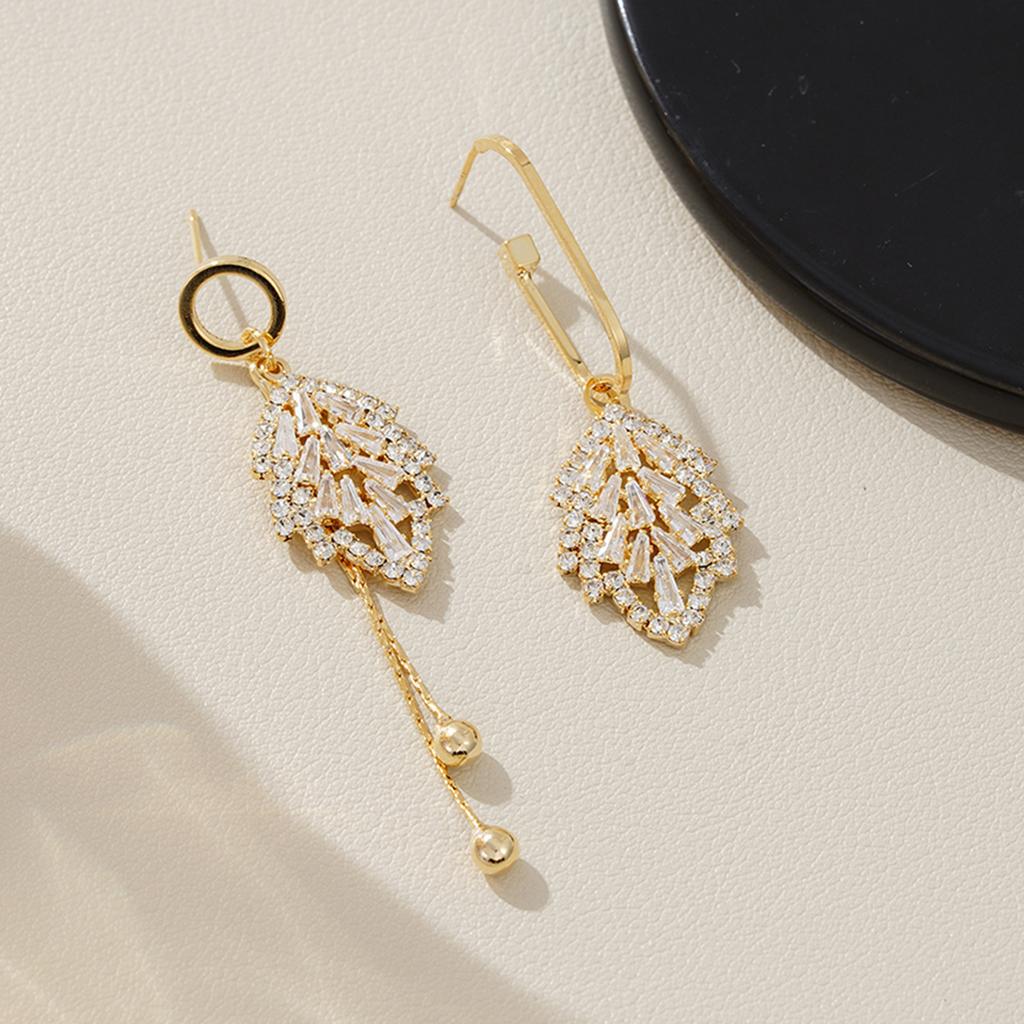 Asymmetrical zircon leaf earrings, high-end light luxury studs, 1011 new trendy niche design temperament earrings