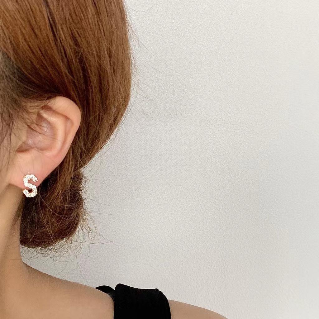 Korean Micro-Diamond Trendy Letter Stud Earrings: Elegant, High-End Accessories for Women's Unique Style.