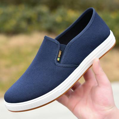 Herrskor i canvas Lätta fritidsskor Nya svarta platta skor Högkvalitativa mjuka herrloafers Slip-on Herr vulkaniserade skor Zapatos