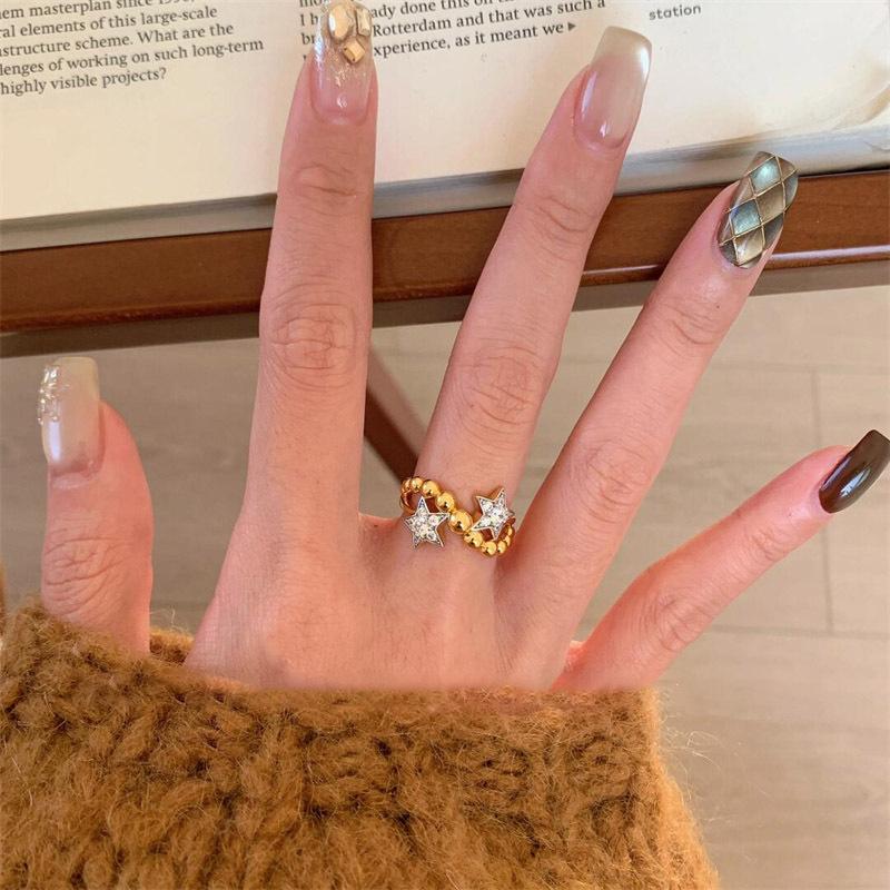 

Циркон неровная звезда открытое кольцо свет роскошная мода ниша хай-энд универсальные серьги