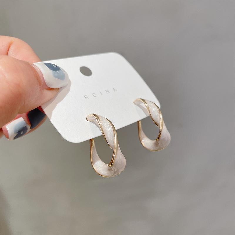 Silver needle Dongdaemun personality tide twisted drip earrings earrings Internet celebrity temperament design earrings wholesale