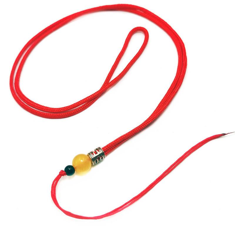 Gioielli lavorati a maglia: Ciondolo con Perla Rosso Ambra con Perle Sfuse di Agata Catena per Maglione Accessori