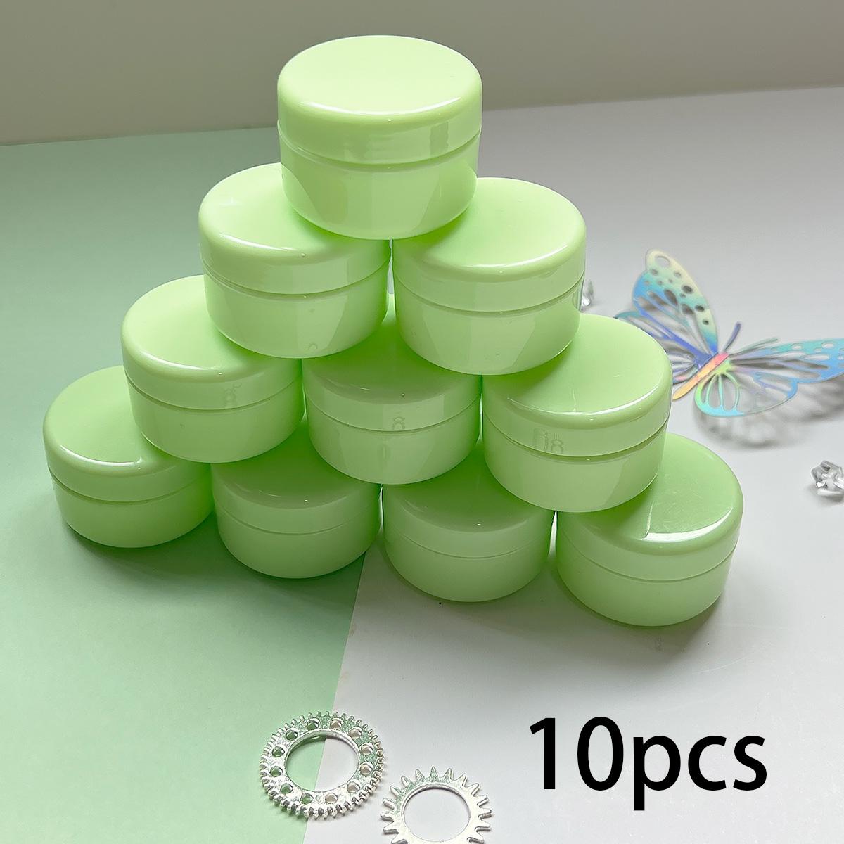 Lege cosmetische pot van botercrème in zwart, brede opening, gezichtscrème verpa Lege cosmetische pot van botercrème in zwart, brede opening, gezichtscrème verpa