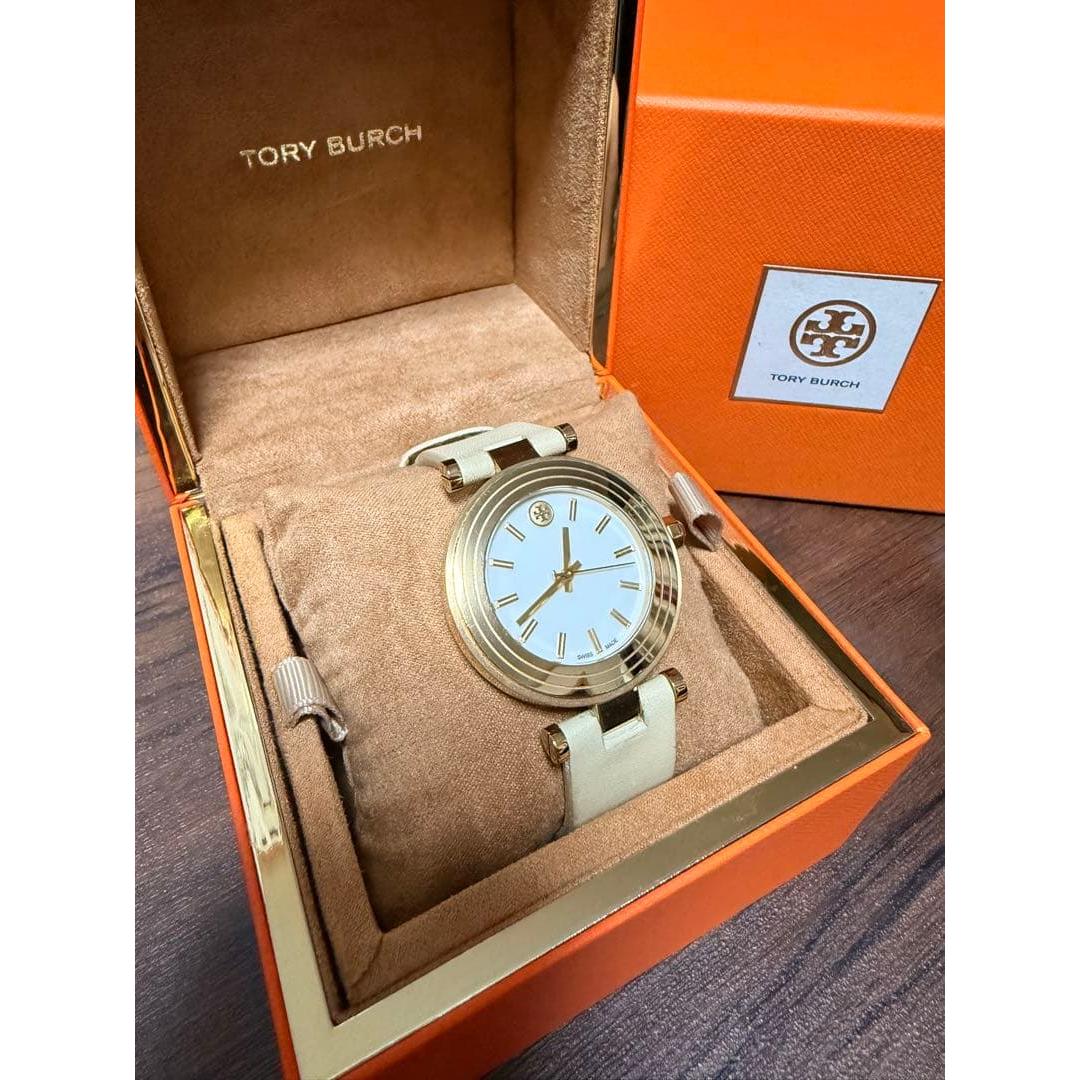 Used TORY BURCH watch white gold color