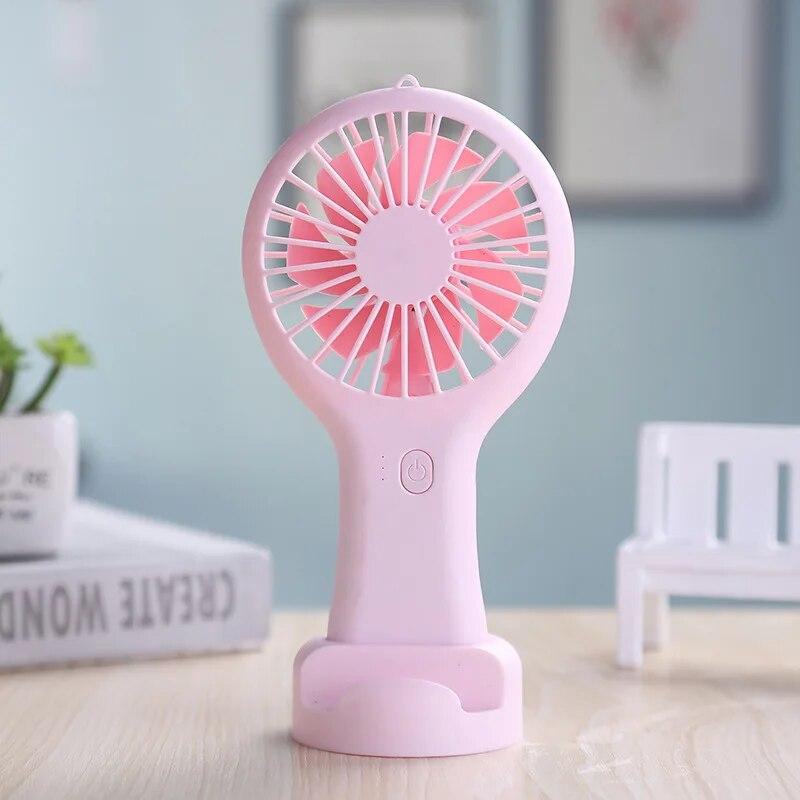 

1PC Creative Mini Handheld Small Fan USB Charging Portable 3 Speed High Wind Desktop Office Travel Pocket Fan Student Quiet розовый