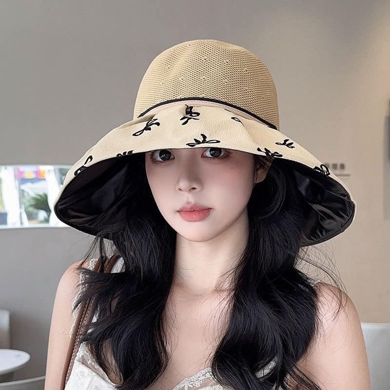 Hat women's spring and summer new bow knitted empty top hat vinyl sunscreen beach sunshade printing folding sun hat