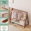 Compact Kids' Floor Clothes Rack: Foldable, Short, and Perfect for Bedrooms & Drying.