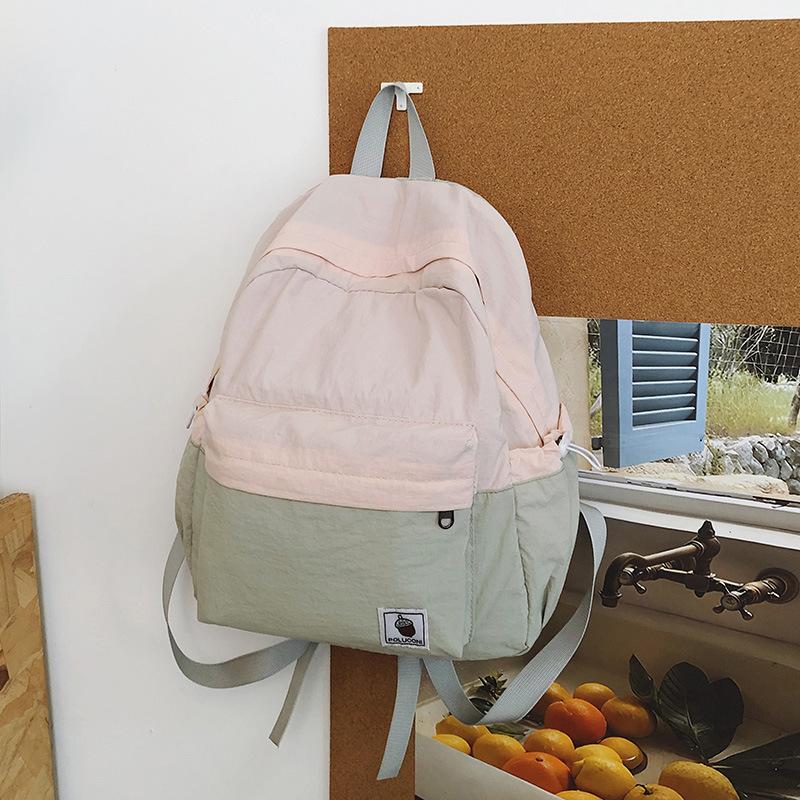 

Large-capacity casual nylon cloth women s backpack going out for travel, large bag for primary and secondary school students, schoolbag розовый