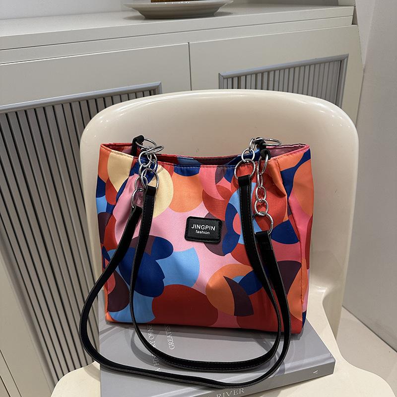 Personality trend Spring and summer new fashion contrasting colors women's large capacity shoulder underarm portable tote bag