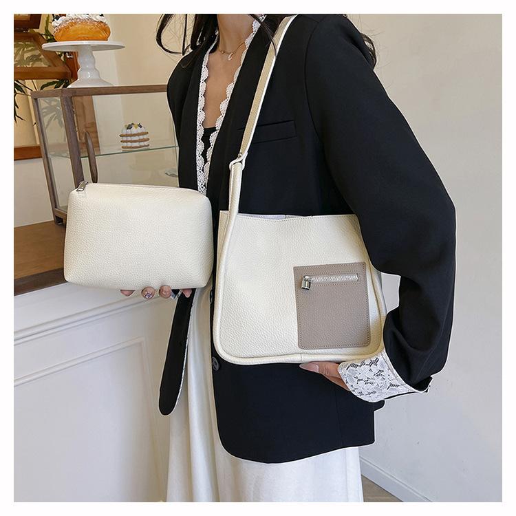 Women's bag spring new simple and fashionable contrasting colors lychee pattern shoulder bag texture child and mother small square bag tide