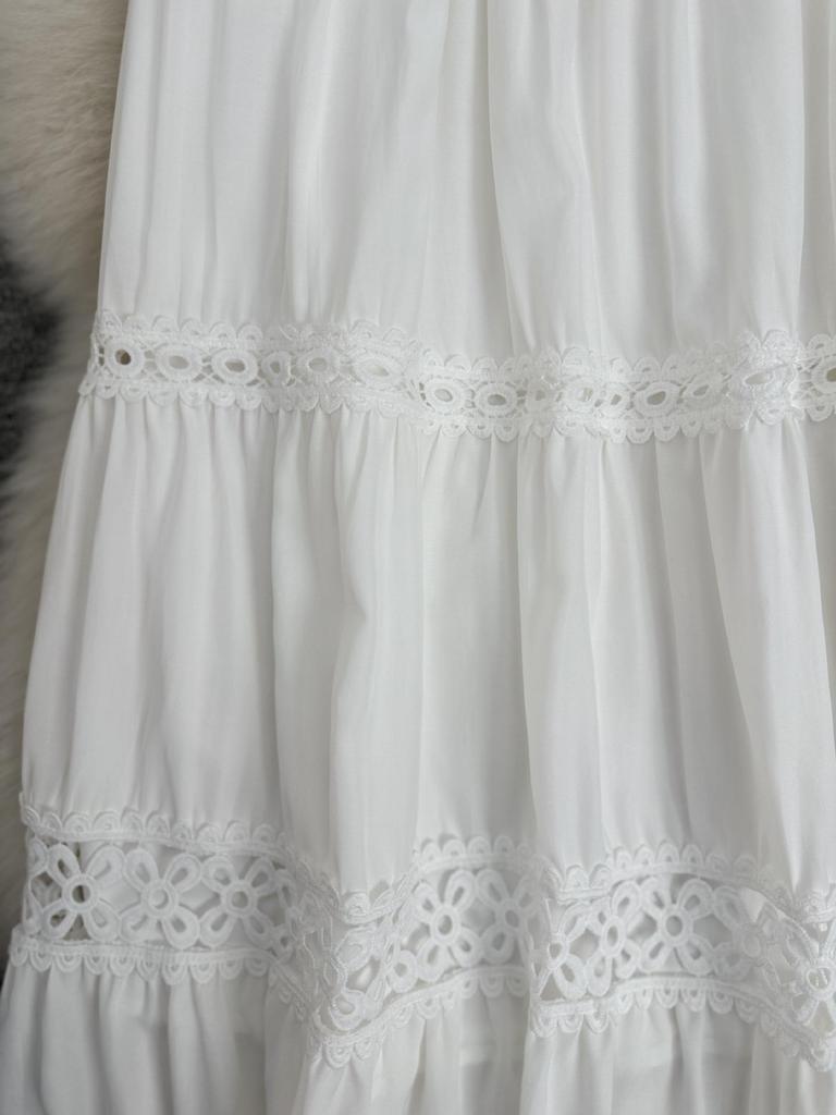 Women's A-Line Midi Skirt with Hollow Patchwork and Large Hem – Classic, Versatile, and Gentle for Commute.