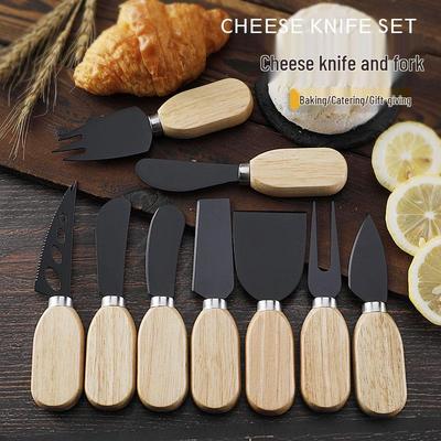 Grenzüberschreitendes Käse- und Obstmesser-Set: Schwarzes Käsemesser, Butterstreicher, Gabel mit Gummibaumholzgriff.