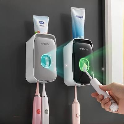 HOMZY Automatický dávkovač zubní pasty Nástěnný Koupelnový Odšťavňovač zubní pasty Bez děrování Stojan na držák zubních kartáčků Koupelnové příslušenství