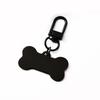 Pet Anti-Lost Bone Dog Tag Keychain with Engraved Logo.