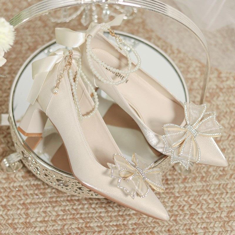 High heels women's summer 2025 new high-end pointed head bow wedding shoes rhinestone beaded shallow mouth single shoes women