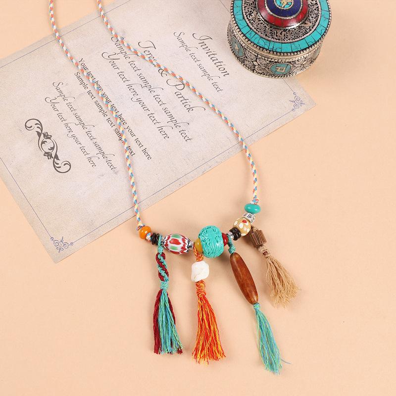 

Hand rubbed cotton rope Tibetan necklace Thangka turquoise pendant retro hand-woven long fringed hanging rope